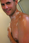hot guy soaping up in the shower.